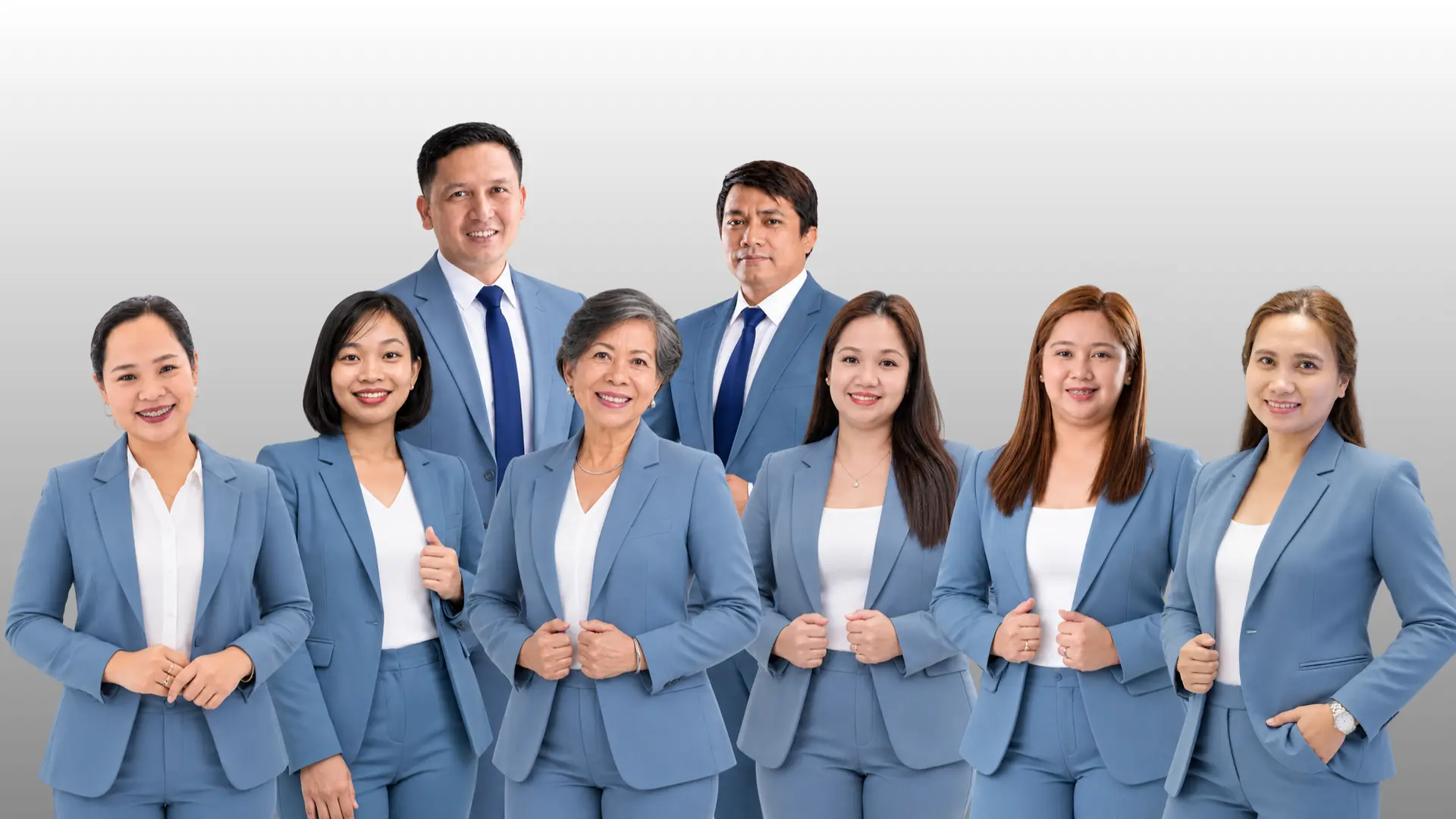 The Leadership Team of Zion-Rose Financials in coordinated blue professional attire